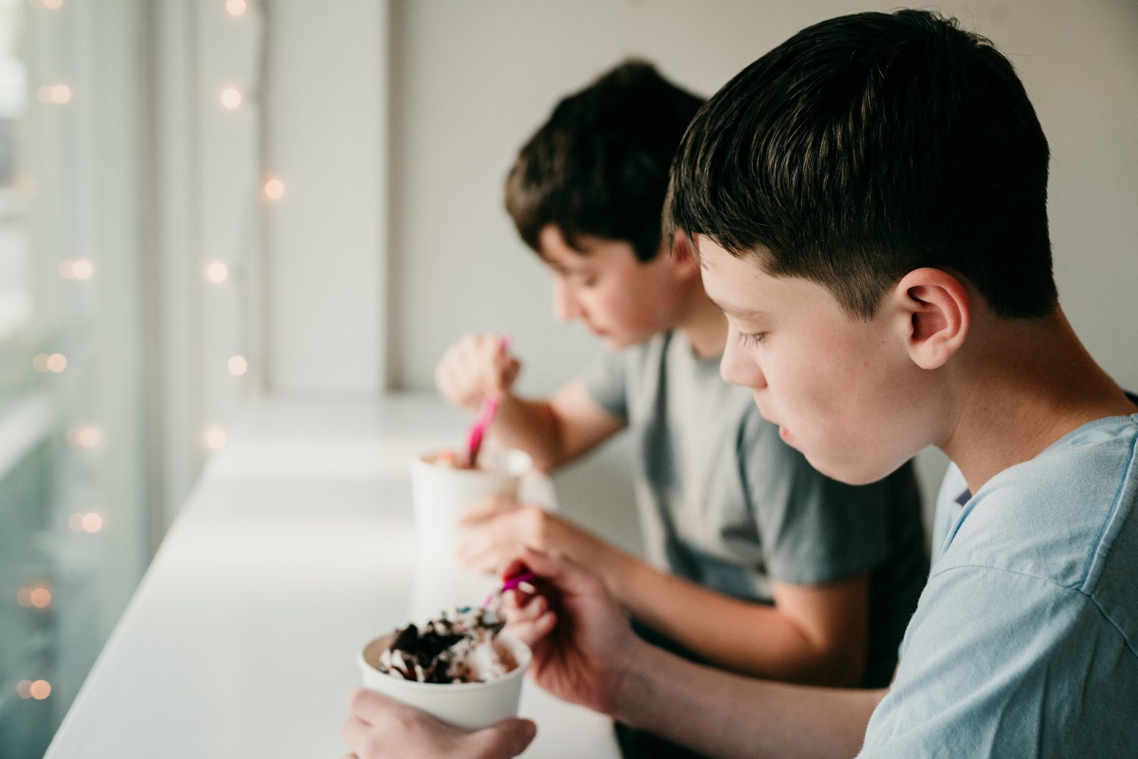 Young guests enjoying frozen yogurt together at Chill on the Hill